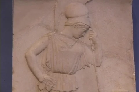 Marble relief sculpture stele (tombstone) of the Greek goddess Athena in her Stock Footage