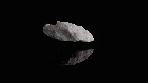 Marble rock rotate in studio light Video stock 124333567