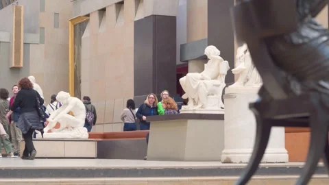 Marble Sculptures And Visitors On Musee d Orsay Gallery Floor At Ground Level Stock Footage 339661592