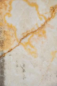 Marble slab with interesting patterns of orange and grey veins. Natural artistry Stock Photos