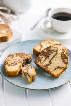 Marble sponge cake. Cake with cocoa and vanilla taste on plate. Stock Photos