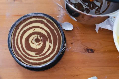 Marble sponge cake elaboration process. Top view. Pastry shop. Stock Photos