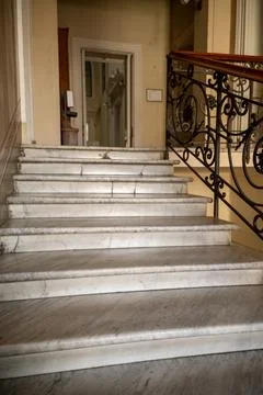 Marble staircase in the building going up. Stock Photos
