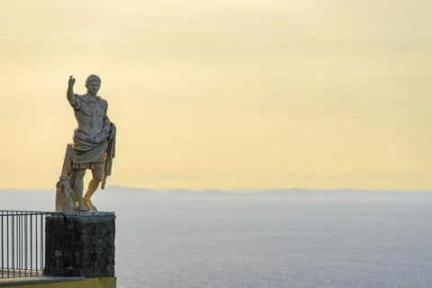 Marble statue of Caesar Augustus overlooking Anacapri at Capri Island, Italy. Stock Photos