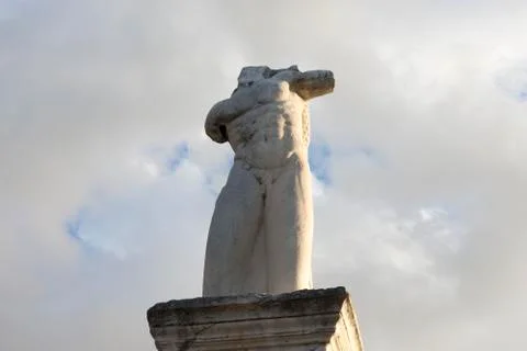 Marble statue of a giant Stock Photos