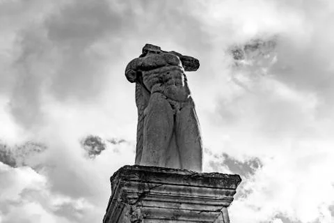 Marble statue of a giant Stock Photos