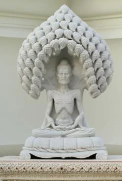 Marble statue of the old buddha Stock Photos