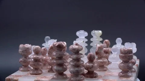 Marble Stone Chess Set Game Isolated on Black Spinning, 4K Stock Footage 70543173