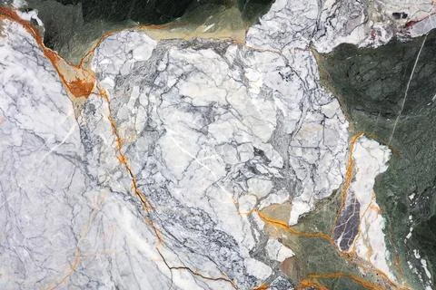 Marble stone with intricate patterns showing different colors and textures .. 库存照片