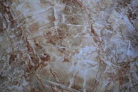 Marble stone texture with brown veins and rough surface. Stock Photos
