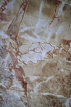 Marble stone texture with brown veins and rough surface. Stock Photos
