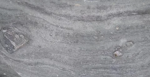 Marble stone texture with gray tones and smooth polished surface Stock Photos