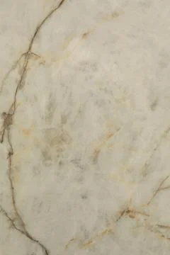 Marble surface with intricate patterns and textures in light tones and subtle Stock Photos