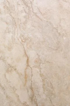 Marble surface with light beige tones and subtle patterns ideal for interior 스톡 사진