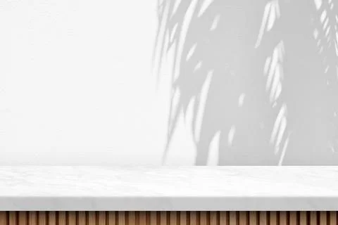 Marble Table with Coconut Leaves Shadow on Wall Texture Background Stock Photos