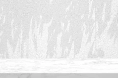 Marble Table with Leaves Shadow on Stucco Wall Texture Background Stock Photos