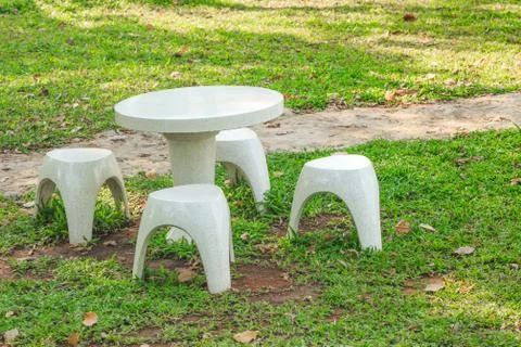 Marble table set in the garden Stock Photos