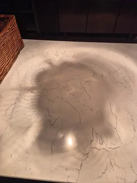 Marble table surface with soft sunlight and reflections Stock Photos