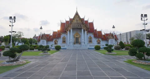 The Marble Temple Wat Benchamabophit sunset light it is a Buddhist temple Stock Footage 335080654