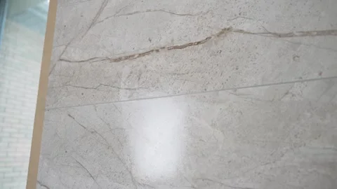 Marble texture with beige and brown veining on polished surface Stock Footage 340458349