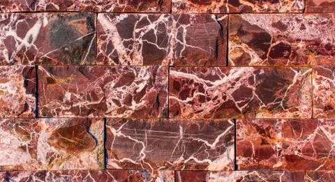 Marble texture decorative brick, wall tiles made of natural stone. Building Stock Photos