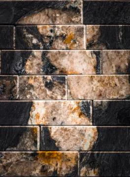 Marble texture decorative brick, wall tiles made of natural stone. Building Stock Photos