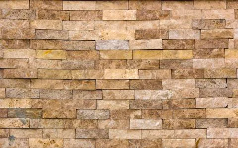 Marble texture decorative brick, wall tiles made of natural stone. Building Stock Photos