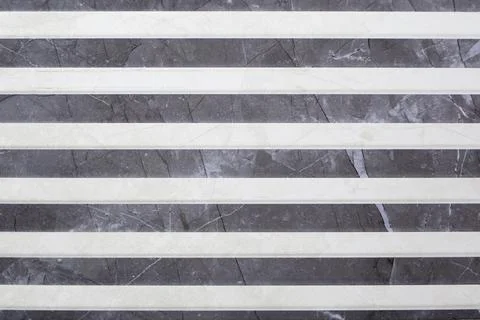 Marble texture with white stripes on the tile. Marble background. Blurred bac Stock Photos
