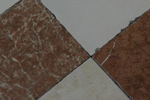 Marble tiled floor in diamond pattern Stock Photos