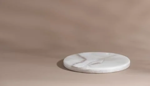 Marble tray on a beige background Stock Photos