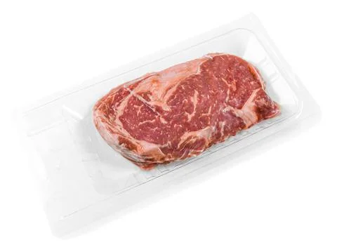 Marbled beef steak. Vacuum packed. View from above. White background. Isolate Stock Photos