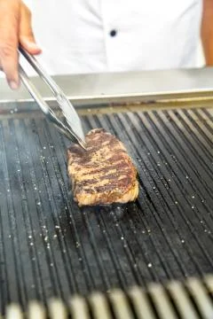 Marbled beef steaks grilled with pepper and bread Stock Photos