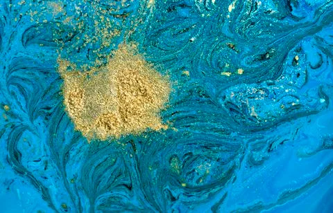 Marbled blue abstract background with golden sequins. Liquid marble ink pattern. Stockillustratie
