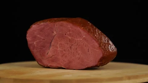 Marbled meat cut of beef fast rotating on black background Stock Footage 167783666