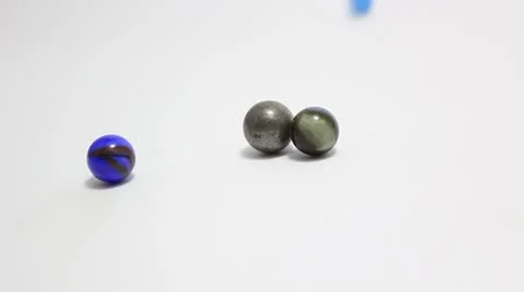 Marbles bumping back and forth _1 Stock Footage 8852788