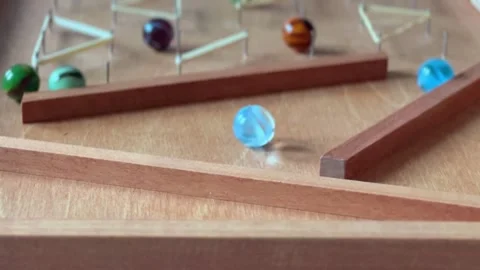 Marbles Landing Normal Speed Stock Footage 300734773