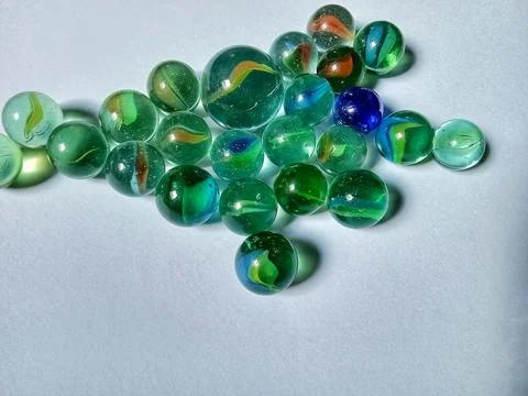 Marbles on a paper background Фото