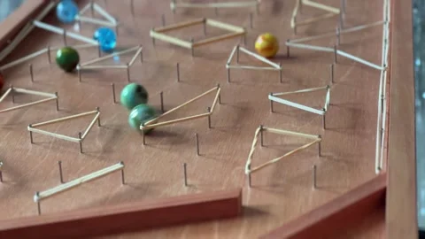 Marbles racing medium shot normal speed Stock Footage 300735140
