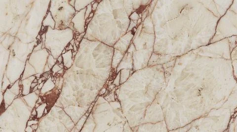 MarbleSurfaceWithRedVeinsNaturalTextureCloseUp. Stock Photos