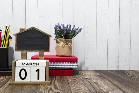 March 01 calendar date text on white wooden block a table. Stock Photos