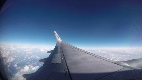 March 04, 2017 - Ryanair Boeing 737 is flying in turbulence zone over the clouds Video stock 74900663