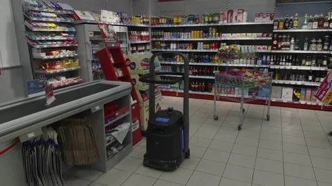 March 1, 2026. Munich, Germany. A smart cleaning robot autonomously vacuuming Stock Footage 330429838