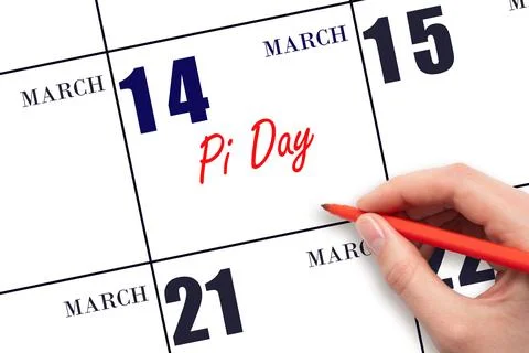 March 14. Hand writing text Pi Day on calendar date. Save the date. Stock Photos