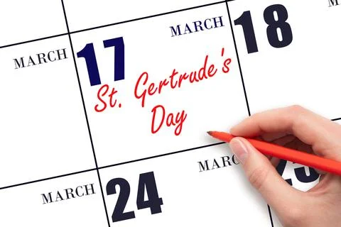 March 17. Hand writing text St. Gertrude's Day on calendar date. Save the dat Stock Photos