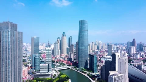 March 6, 2023, riverside CBD in China  Golden sunset reflections on glass Stock Footage 304314484