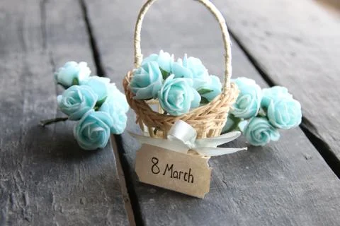 March 8. Rustic still life, roses and tag Stock Photos
