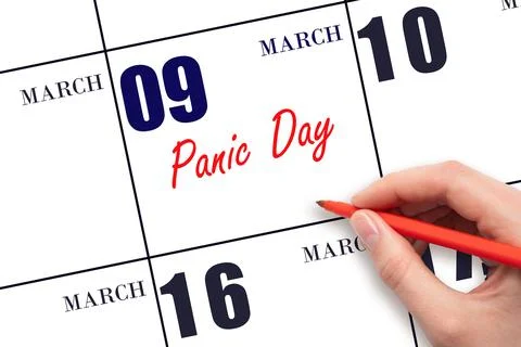 March 9. Hand writing text Panic Day on calendar date. Save the date. Stock Photos