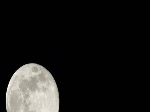 March Worm Moon 99 Percent Full, Waning Gibbous Video stock 73457432