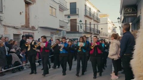 Marching Band Playing Brass Instruments During Carnival Parade In Spain Stock Footage 332140510