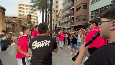 Marching band playing music during the Cullera Gay Pride parade Vidéo 337784145